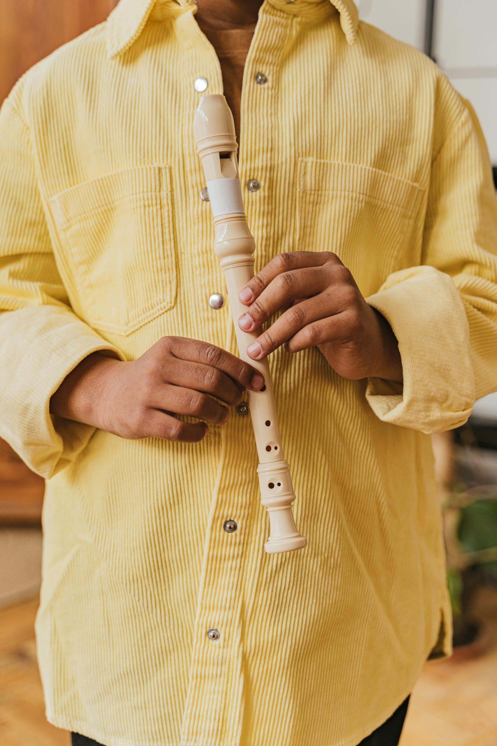 Child Holding Recorder