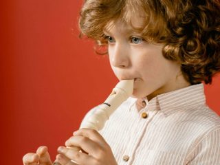 Boy Playing Recorder