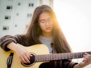 Girl Playing Guitar