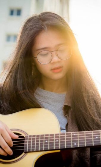 Girl Playing Guitar Girl Playing Guitar